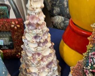 Seashell encrusted decorative cone tree