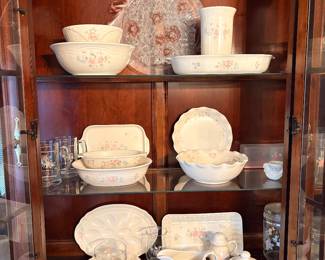 vintage Pfaltzgraff Tea Rose stoneware featuring pastel pink roses and blue floral watercolor motifs
