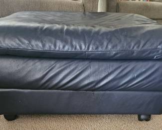 Black leather ottoman