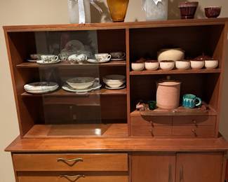 MCM mid century Scandinavian dining room. Solid maple with brass pulls. Table, 4 side chairs, 1 arm chair and china cabinet. Cabinet has 2 glasses doors, adjustable glass shelves, 2 small drawers with open display area