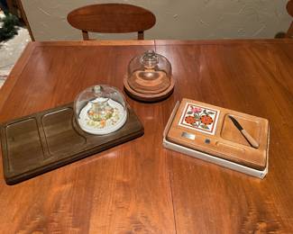 Vintage Goodwood wooden cheese and cracker serving trays featuring retro floral ceramic tile accents and clear glass domes.
