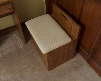 padded desk stool that opens for storage