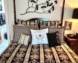 Beautiful black four poster bed with gold  leaves and like new queen mattress