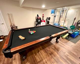 Brunswick pool table with black felt top