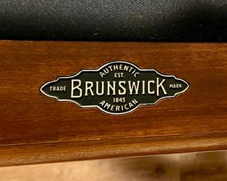 Brunswick pool table with black felt top