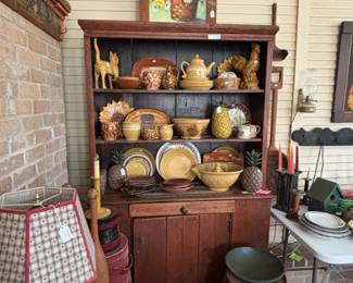 yellow ware and red ware cupboards