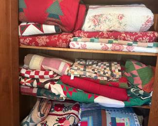 tons of antique quilts