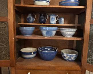 cupboard full of blue bowls