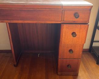 Sewing machine cabinet