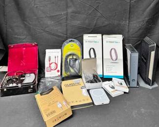 17WH137Electronics Mystery Lot Fitbit, Apple And More