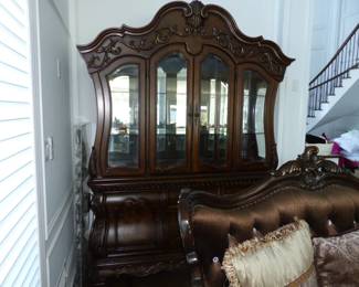 Traditional breakfront display cabinet