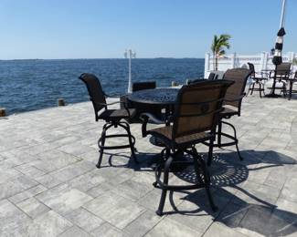 Beautiful outdoor bistro table with 3 bar stools (more bar stools available)
