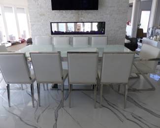 Modani modern sleek extendable white glass dining table with 10 white & chrome Modani chairs