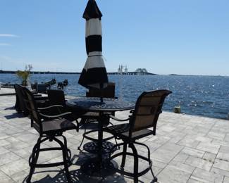 Beautiful outdoor bistro table with 3 bar stools & umbrella (more bar stools available)
