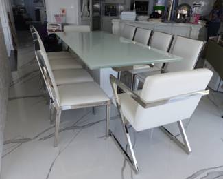 Modani modern sleek extendable white glass dining table with 10 white & chrome Modani chairs