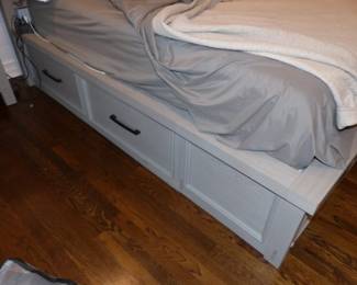 Gray wood bedroom set with storage in bed, night table, dresser & chest