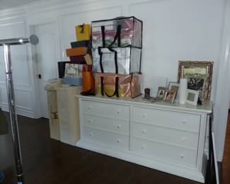 Bellini dresser, empty designer boxes, picture frames