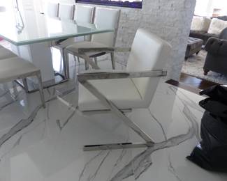 Modani modern sleek extendable white glass dining table with 10 white & chrome Modani chairs