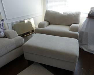 Neutral sofa, pair of oversized chairs with ottomans