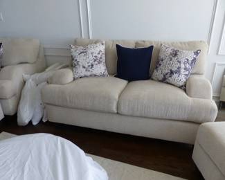 Neutral sofa, pair of oversized chairs with ottomans