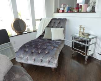 Gray velvet tufted chaise, mirrored chest