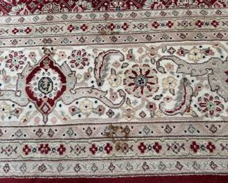 B42 - $395. Dining Room Rug. Measures 92" x 10'. Has a stain on one end toward the edge - see photos. 