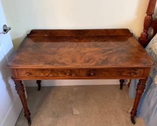 B32 - $325. 2 Drawer Antique Writing Desk. Measures 47" x 23.5" x 29.5" tall. 