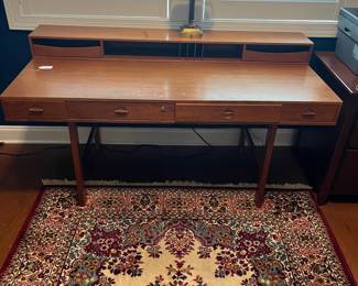 B2 - $850. Peter Løvig Nielsen, Flip-Top Executive Desk in Walnut. Denmark, 1970Measures 63.75" x 28.75" x 34" tall (at the tallest spot). 29" top of the desk to the floor.  Desk has been well loved - it is still sturdy and very useable but does have one broken handle and marks on the surface - see photos. 