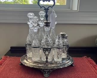 B139 - $125. Cruet Stand & Condiment Set. E L Kingston & Co. Silver Plated. Measures 12" x 8" x 13" tall. 2 Cruets have heavy damage - included if you want them but not calculated into the price)