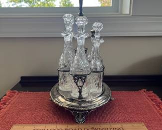B139 - $125. Cruet Stand & Condiment Set. E L Kingston & Co. Silver Plated. Measures 12" x 8" x 13" tall. 2 Cruets have heavy damage - included if you want them but not calculated into the price)