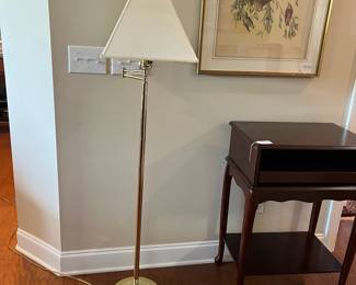 B23 - $50. Brass Floor Lamp with Swing Arm. Measures 60" tall. Shade is in good condition. 