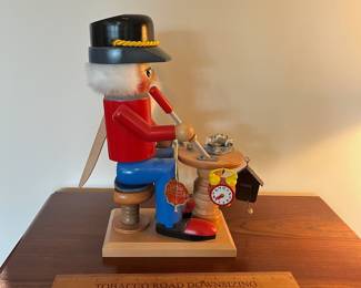 B96 - $80. Vintage Steinback Volkskunst Clock Maker Nutcracker Music Box. Measures 13.5" tall. 