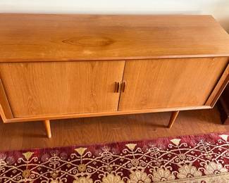 B27 - $1750. Mid Century Danish Teak Credenza with Tambour Doors.  Overall very good condition - has some minor surface scratches. Doors slide easily. Measures 59" x 19" x 31.5" tall. 