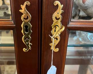 B10 - $275. Statton, Chippendale Style, Mahogany, Lighted Display Cabinet with 4 Adjustable Glass Shelves (1 is permanent). Measures 42" wide x 16" deep x 81.5" tall. 