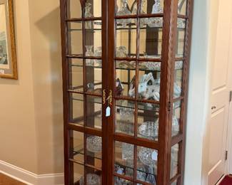 B10 - $275. Statton, Chippendale Style, Mahogany, Lighted Display Cabinet with 4 Adjustable Glass Shelves (1 is permanent). Measures 42" wide x 16" deep x 81.5" tall. 