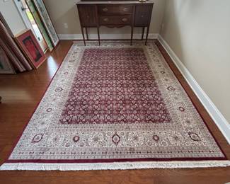 B42 - $395. Dining Room Rug. Measures 92" x 10'. Has a stain on one end toward the edge - see photos. 