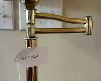 B23 - $50. Brass Floor Lamp with Swing Arm. Measures 60" tall. Shade is in good condition. 