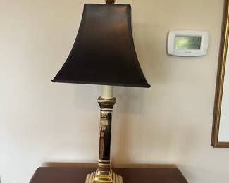 B18 - $45. Heavy Brass Table Lamp. Measures 23.75" tall. Black Shade is in very good condition. 