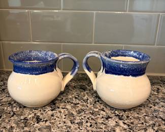 B70 - $10. Pair of Unsigned Pottery Mugs. 