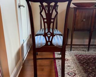 B41 - $950. Round Wooden Dining Table with 8 Chairs. Table is 5' round x 29.5" tall. Floor to bottom of table lip is 25.5".  Table has 3 leaves. 2 - 18" leaves. 1 - 13" leaf. Includes table pads for all. Overall very good vintage condition, a few surface marks not deep gouges. Chairs are all sturdy with varying wear on cushions and wood.  