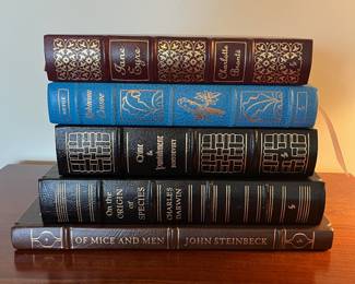 B87 - $30 EACH. The Easton Press. (Jane Eyre CLAIMED.) Robinson Crusoe. Crime & Punishment. On the Origin of Species. Of Mice and Men. 