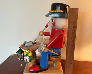 B96 - $80. Vintage Steinback Volkskunst Clock Maker Nutcracker Music Box. Measures 13.5" tall. 