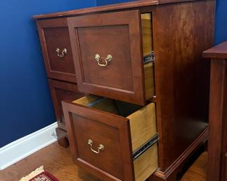 B4 - $60. Howerton Reproductions Wooden 4 Drawer Filing Cabinet. Measures 37" wide x 24" deep x 37.25" tall. Very sturdy and drawers slide easily. 