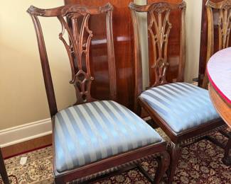 B41 - $950. Round Wooden Dining Table with 8 Chairs. Table is 5' round x 29.5" tall. Floor to bottom of table lip is 25.5".  Table has 3 leaves. 2 - 18" leaves. 1 - 13" leaf. Includes table pads for all. Overall very good vintage condition, a few surface marks not deep gouges. Chairs are all sturdy with varying wear on cushions and wood.  
