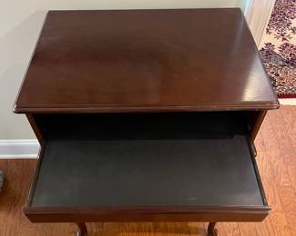 B16 - $50. Small Side Table or TV Stand with single slide out tray. Measures 23.75". 15.75" x 34.75" tall. 