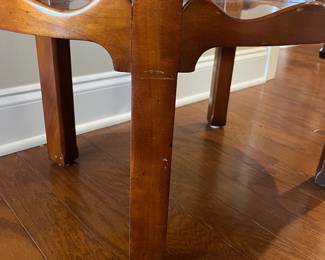 B22 - $145. Oval Two Tiered Wooden Side Table. Top level has glass piece for protecting the wood. Measures 19" x 27.75" x 28.25" tall. 