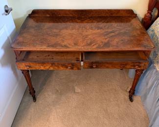 B32 - $325. 2 Drawer Antique Writing Desk. Measures 47" x 23.5" x 29.5" tall. 