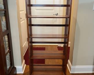 B12 - $50. Folding Bookcase / Shelf. Measures 22.5" w x 11.5" d x 50" tall. 