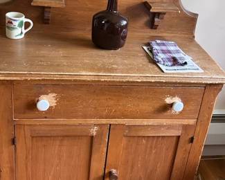 commode with vanity shelves