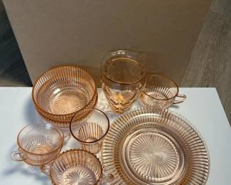 027 largelotofpinkdepressionglasstable